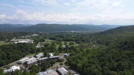 Beautiful-aerial-shot-of-the-mountainous-terrain-in-Lee,-MA