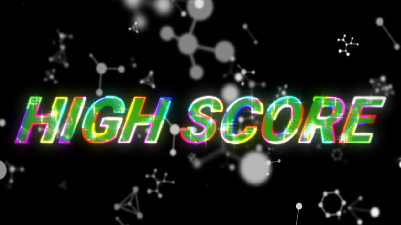 Sfera luminosa che entra nell'inquadratura, collegando nodi e attirando lettere che si scompongono nel testo HIGH SCORE per una pubblicità di gioco