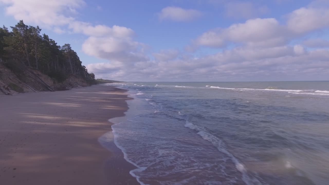 The Baltic Sea Coast In Latvia, Europe. Aerial Low Dolly-Out
