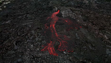 Circular-aerial-shot-over-the-newly-born-lava-of-the-eruption-in-Fagradalsfjall,-Iceland