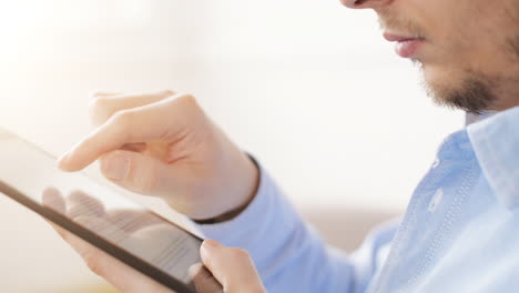 man hand using tablet computer surface touchscreen pad