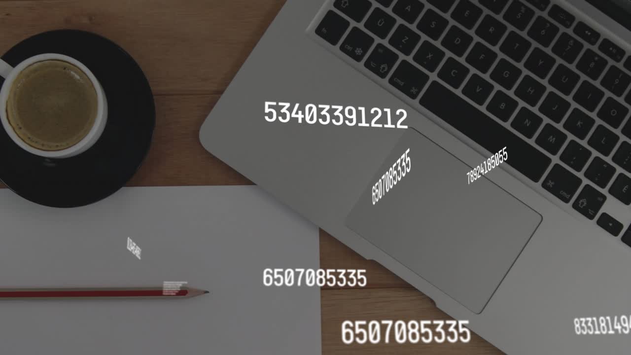 Numeric streams emerging from silver laptop floating above desk revealing paper pencil coffee cup