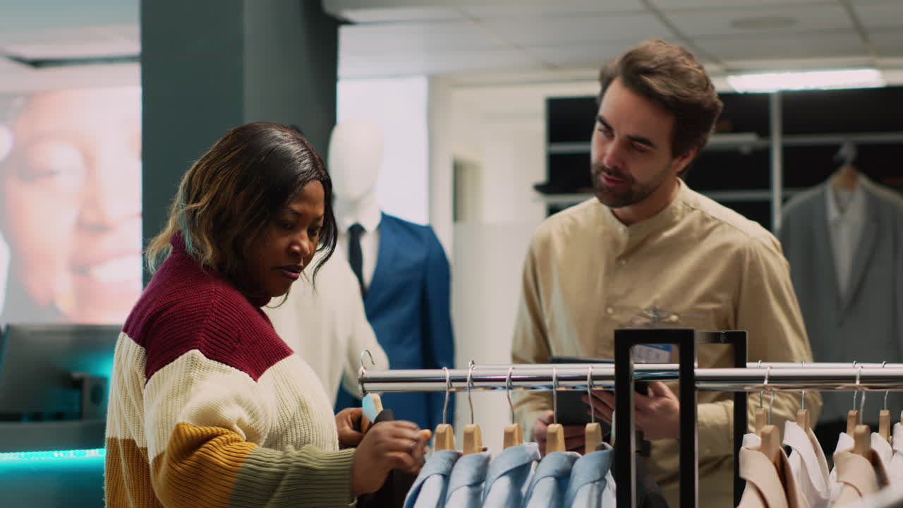 People shopping for clothes in a store
