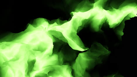 glowing green flame against a dark background