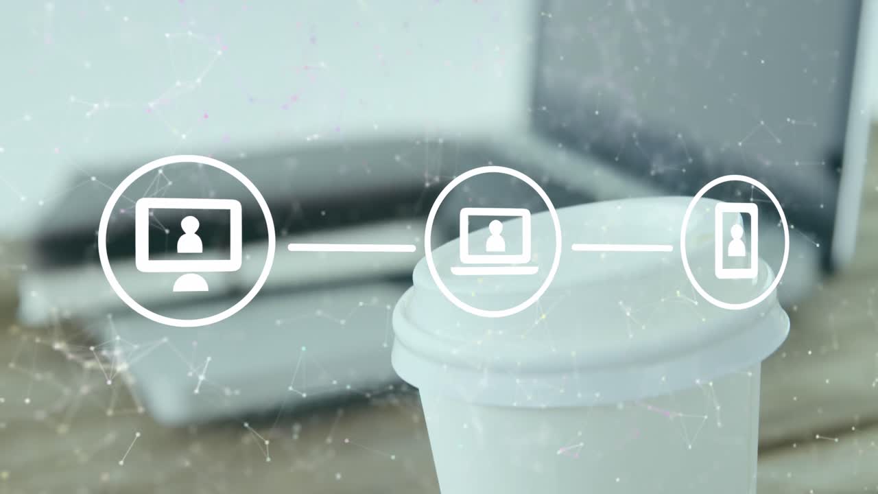 테이블 위의 커피 컵과 노트북 위의 아이콘과 연결된 점의 플로우 차트의 애니메이션