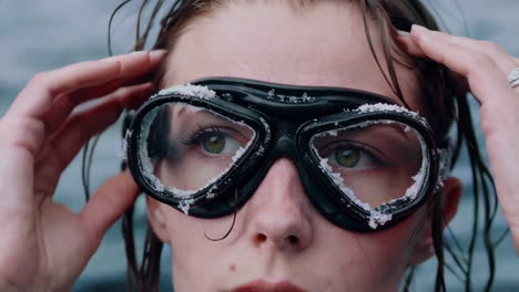 woman wearing a diving mask with frost