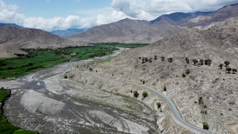 Aerial-View-of-the-Road,-Mountain,-River-and-Greenery-of-Afghanistan