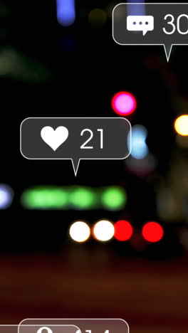 animación de iconos y números de redes sociales sobre el tráfico vial y las luces del paisaje urbano