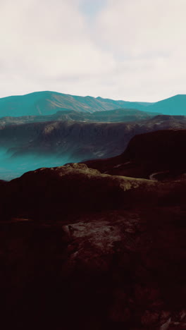 Cloudy sky at dawnbreathtaking landscape showcases a stunning mountain range with dramatic cliffs