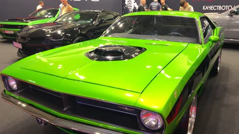 green plymouth road runner classic car at car show