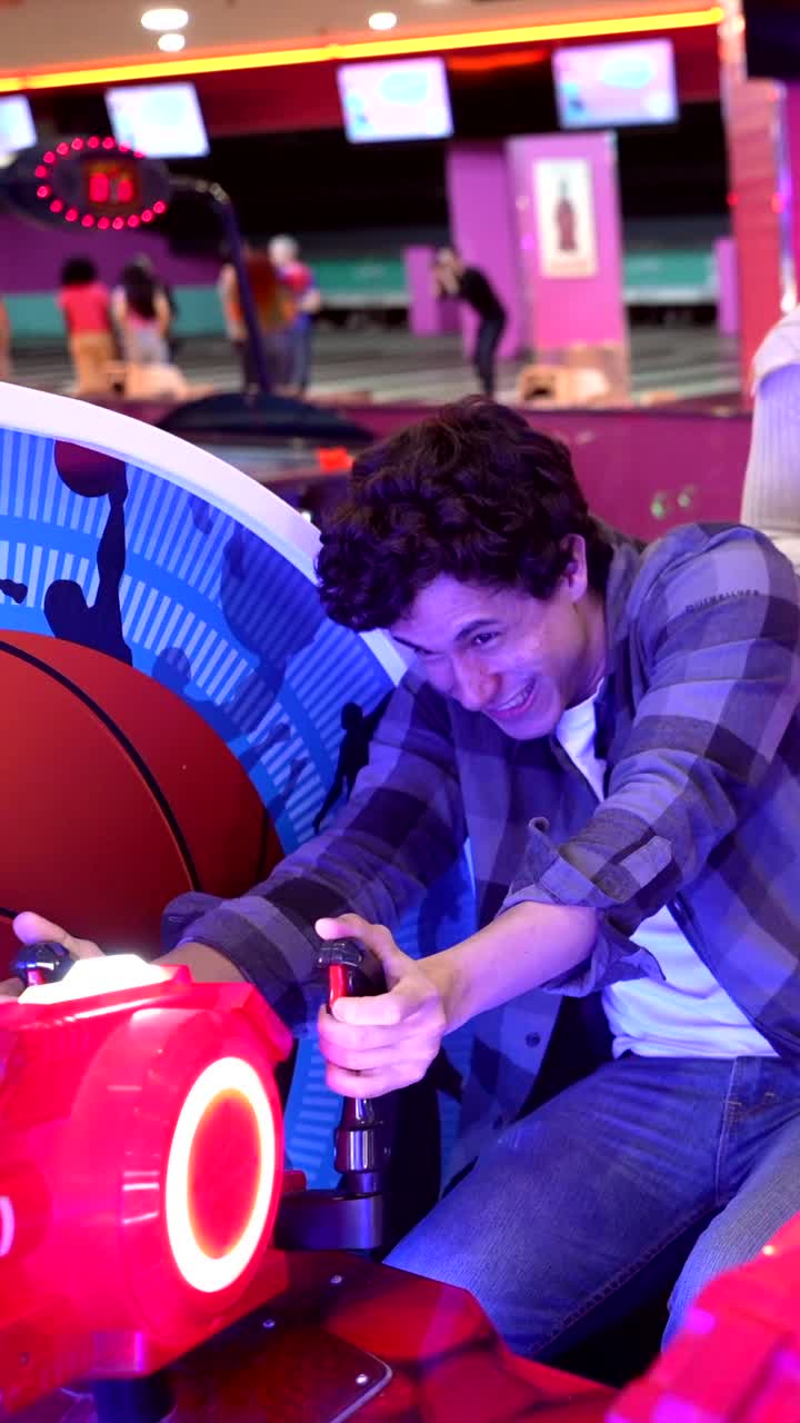 People playing arcade games