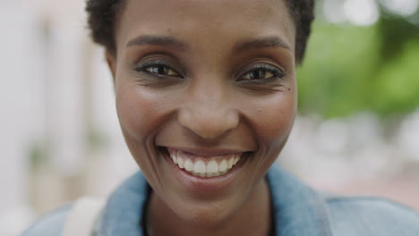 close up portrait of happy african american woman laughing cheerful looking at camera beautiful perfect skin concept