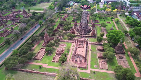 high angle wide overview of temple layout and ancient buddhist ruins in ayutthaya, thailand