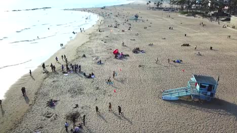 aerial view of crowded beach on a sunny day