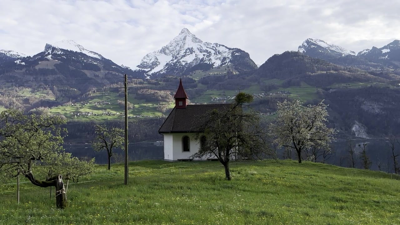 Beautiful house stands against backdrop of majestic Swiss Alps