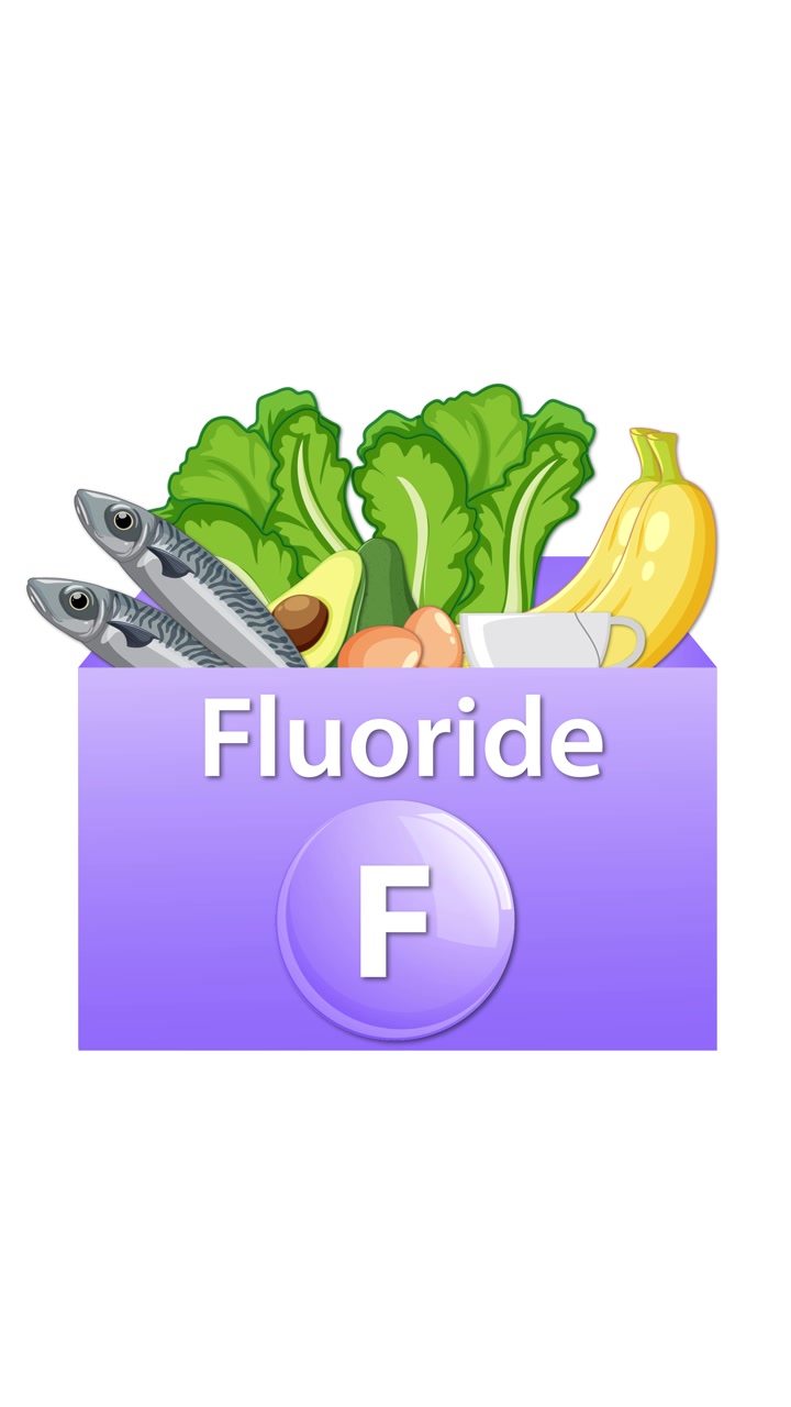 Alimenti salutari scivolano in una scatola etichettata per il fluoro su sfondo bianco, enfatizzando le fonti alimentari di minerali.