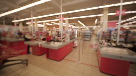 blurred background. checkout counters in the supermarket