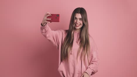 beauty young woman taking selfies with mobile phone
