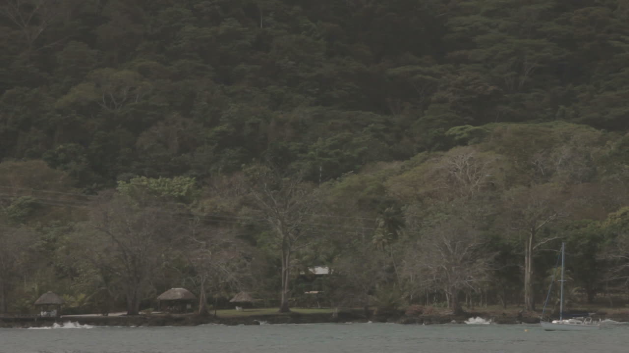 A sailboat rocking at Bahía del Aguacate in Chocó, Colombia.