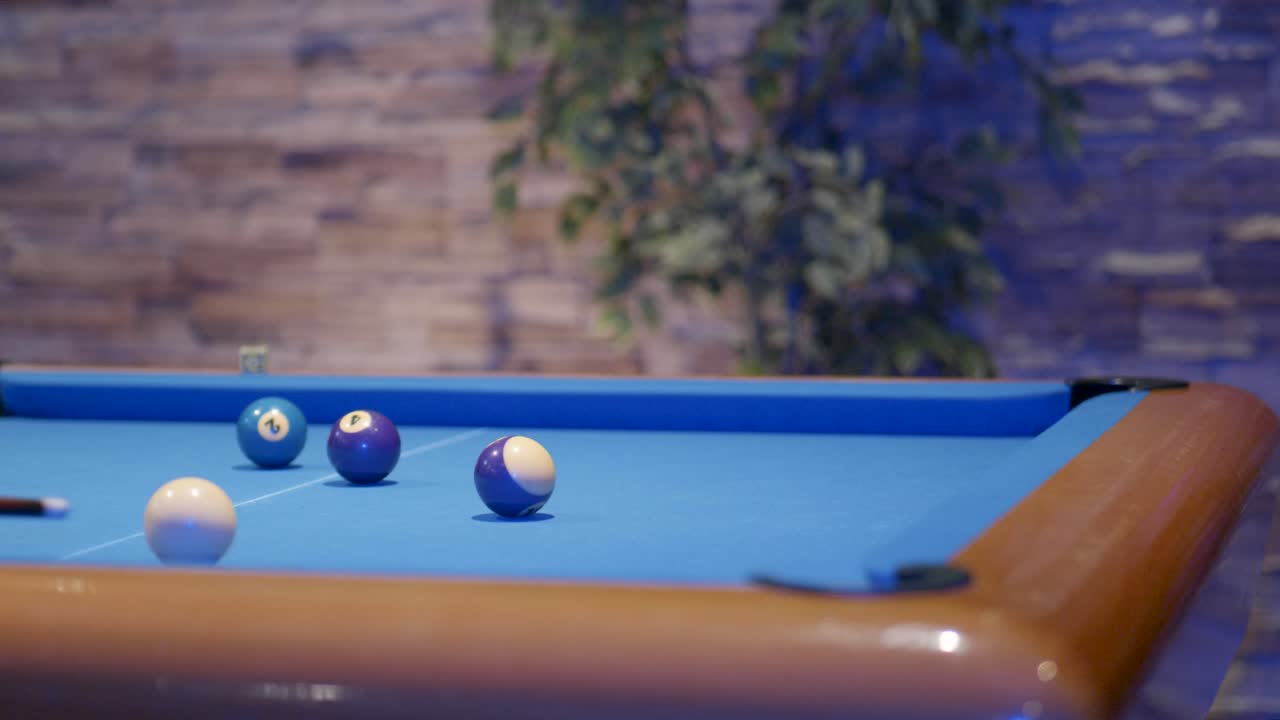 Snooker - pool table player aiming snook balls