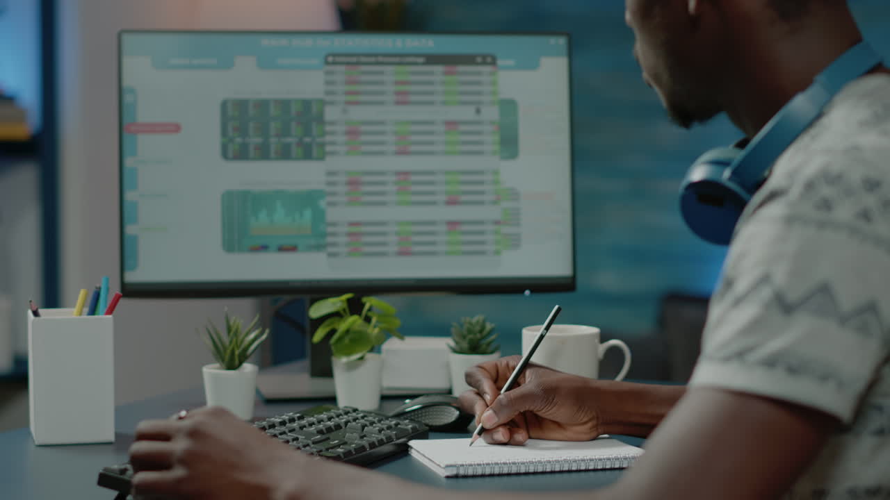 Close up of man analyzing currency exchange on stock market
