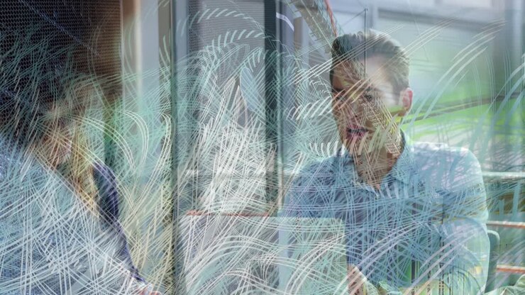 Animation of shapes over diverse business people at office