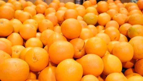 freshly squeezed orange juice pairs well with ripe oranges nearby.
