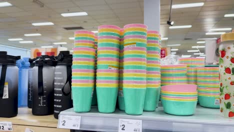 stacked cups and bottles in a department store