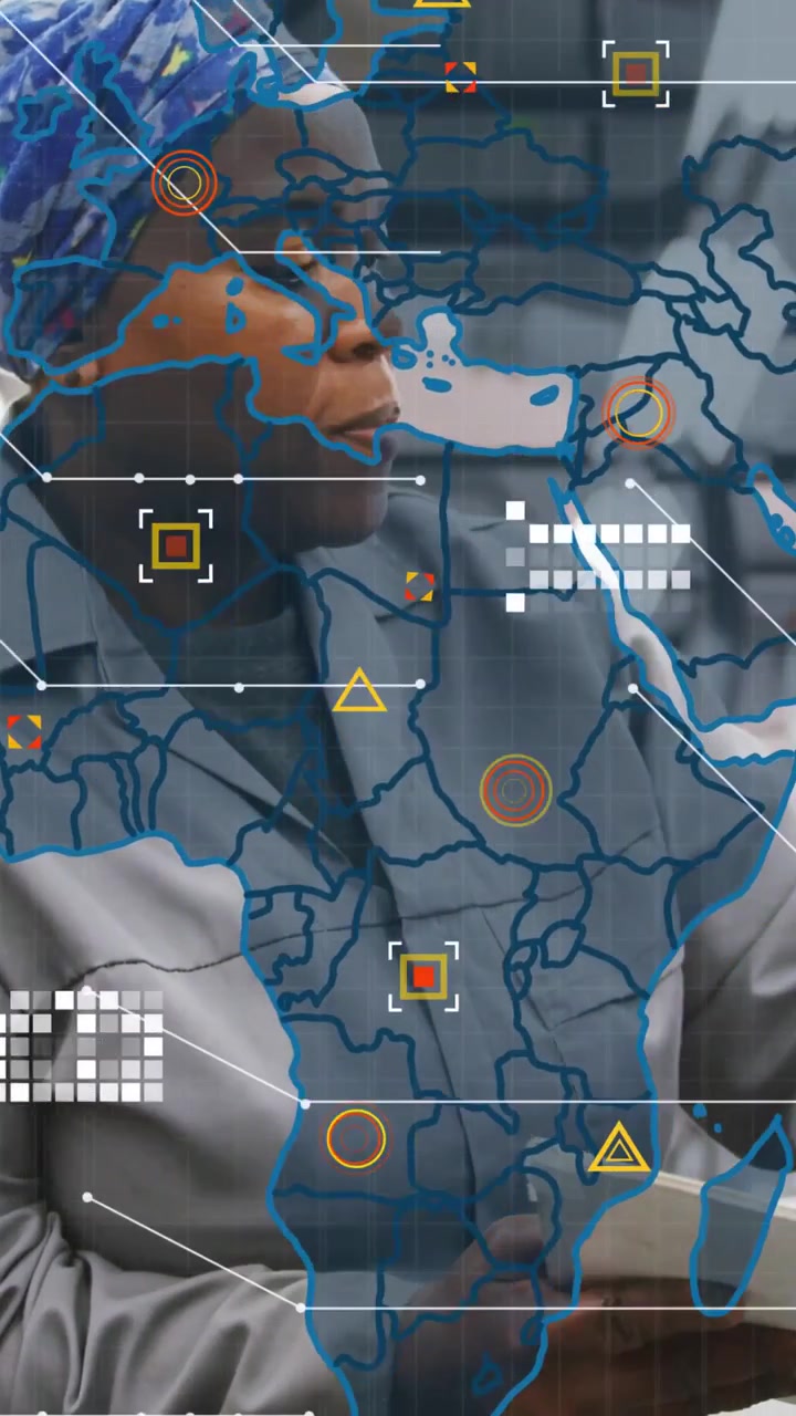 Vertical video: Woman tech inspecting and reaching in plant as Africa EU map overlay appearing