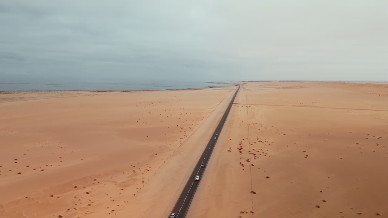 Desert Road and Ocean Coastline Aerial View