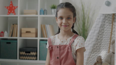 smiling girl in a playroom