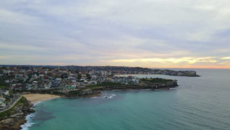 scenery of tamarama and bondi beach with eastern suburbs cityscape at the waterfront in new south wales, australia