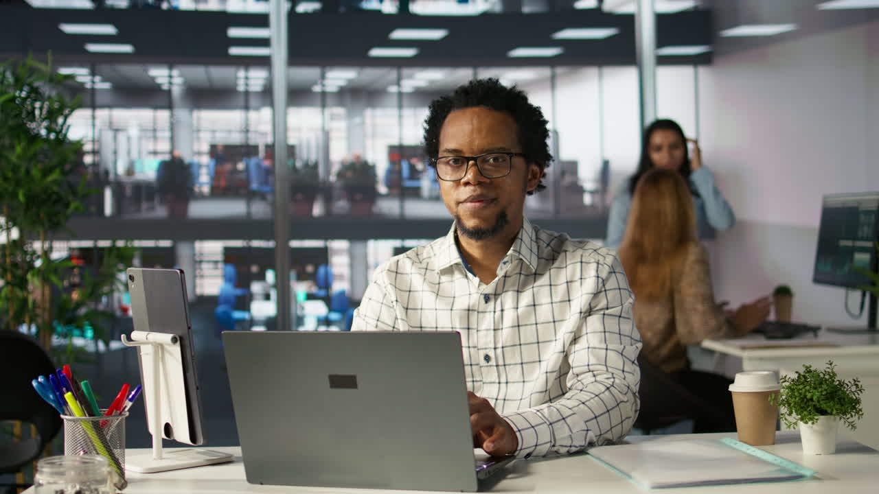 Man working on laptop in office