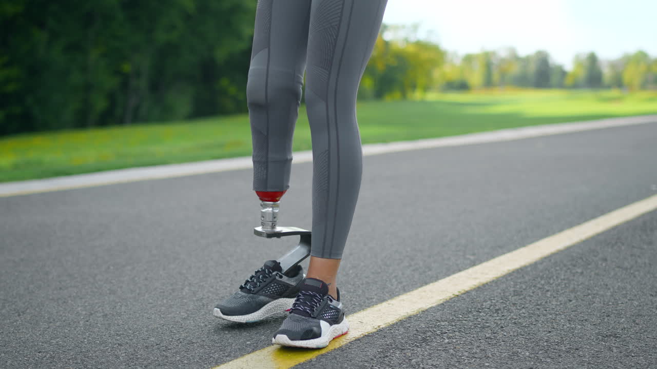 Sportswoman training in park