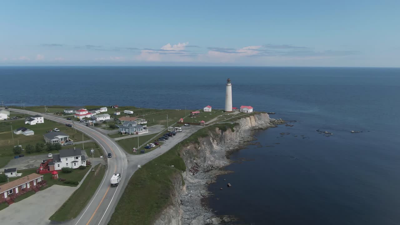 Cap-des-Rosiers Lighthouse With A Scenic View Of Saint Lawrence Gulf In Summer In Gaspe Peninsula, Quebec, Canada