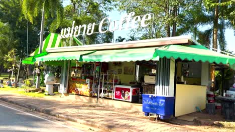 outdoor coffee shop with green awning