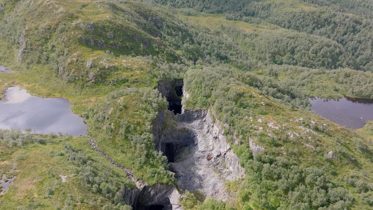 Drone view of old limestone extraction site in Norway, highlighting rocky formations and traces of abandoned quarrying