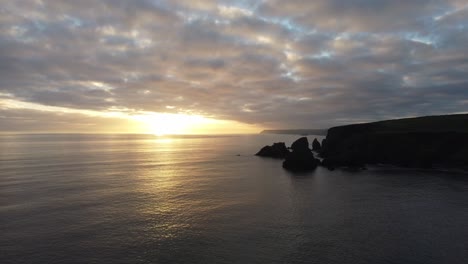 aerial winter sunset of the copper coast coastline on a winter evening