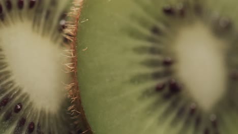 Micro-video-of-close-up-of-slices-of-kiwi-fruit-with-copy-space