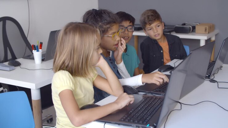 Row of pupils working on task together