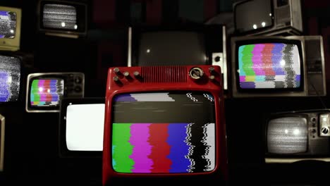 zoom out from green screen to vintage tvs with color bars and a tv set with green screen. 4k.