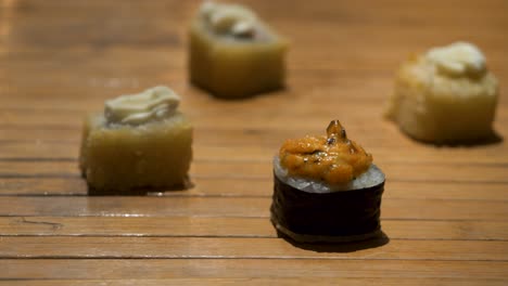 buttered bread bites on wooden table