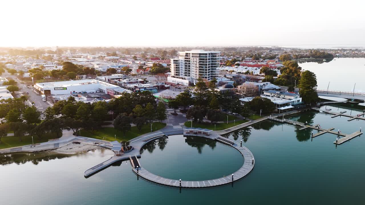 Mandurah foreshore at sunrise, pull out revealing drone shot