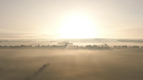 misty sunrise over rural landscape