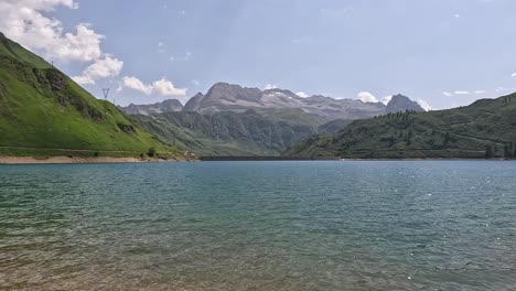 view over clear lago morasco on a blue sky summer day