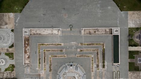 aerial footage above the win win memorial monument, phnom penh, cambodia. top down footage moving above the monument