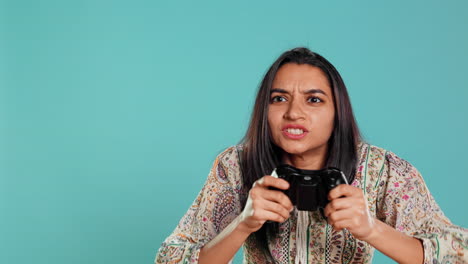 Woman-upset-after-seeing-game-over-message,-holding-controller