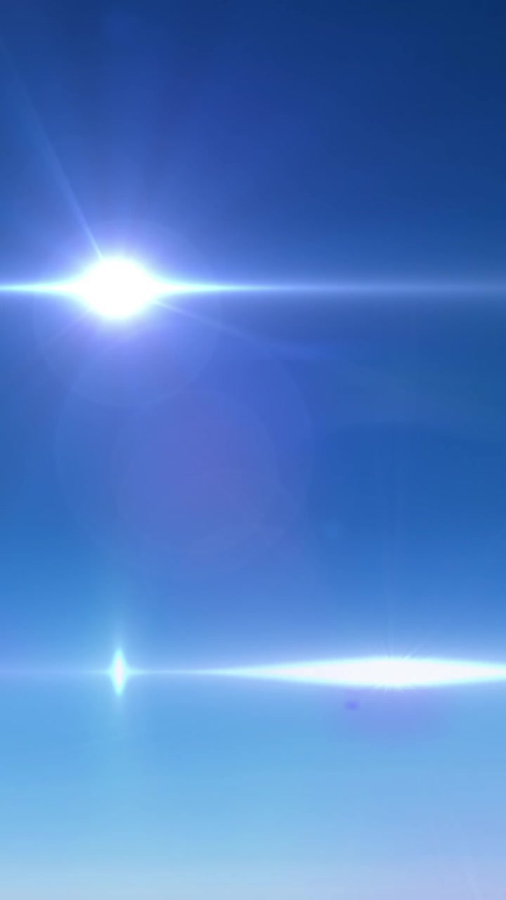 Animazione di un punto luminoso con bagliore della lente su sfondo blu