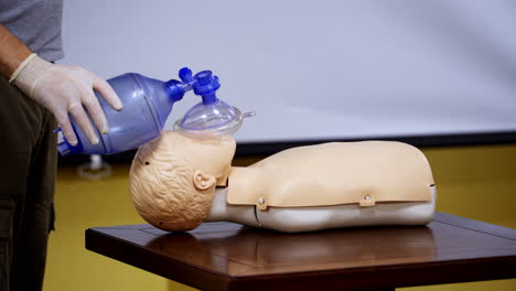 medical simulation mannequin used for practicing techniques with oxygen mask. healthcare and education.