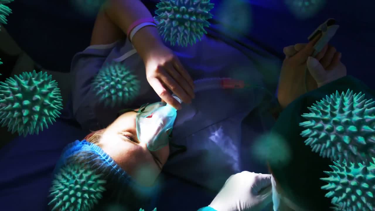 animación de la propagación del coronavirus covid19 con un trabajador de la salud en el fondo